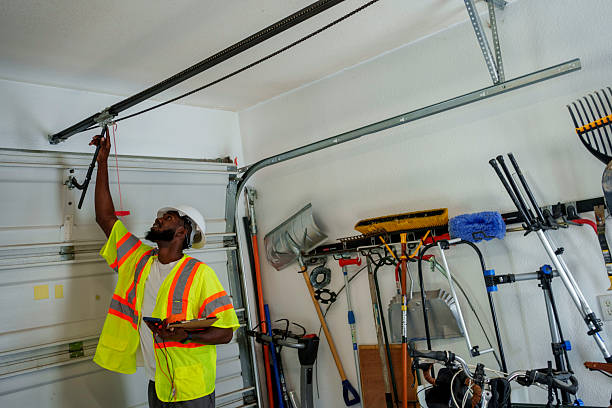 Professional Garage Door Panel Replacement technician working in Williamston, MI